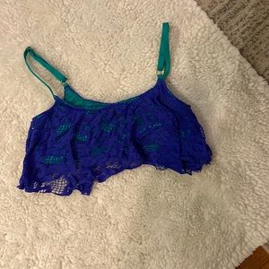 Kenneth Cole, purple and green bikini top in size medium. Great condition.